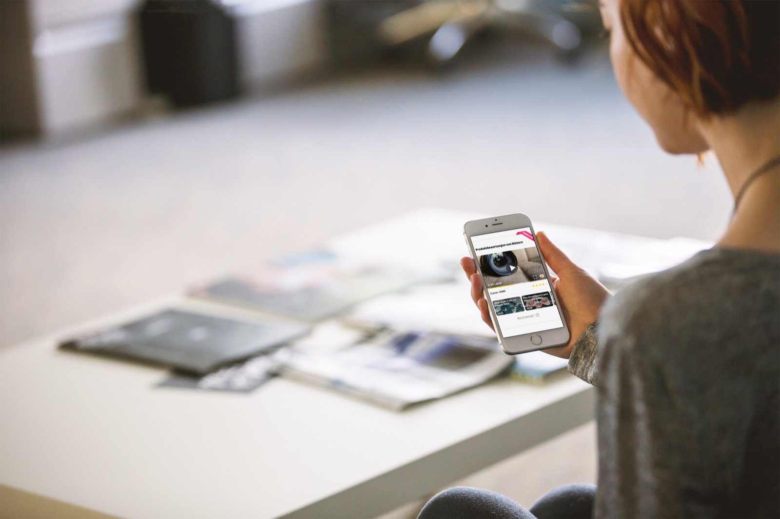 User browsing WeView video reviews on their smartphone